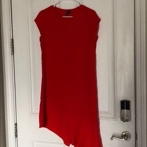Red shift dress with ruffled bottom.